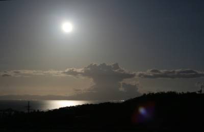full moon over the mainland